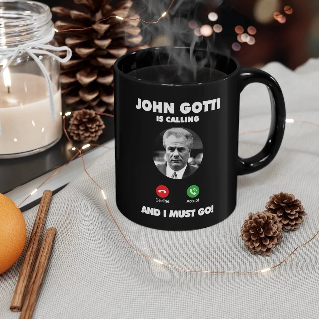 John Gotti is Calling and I Must Go Black mug 11oz