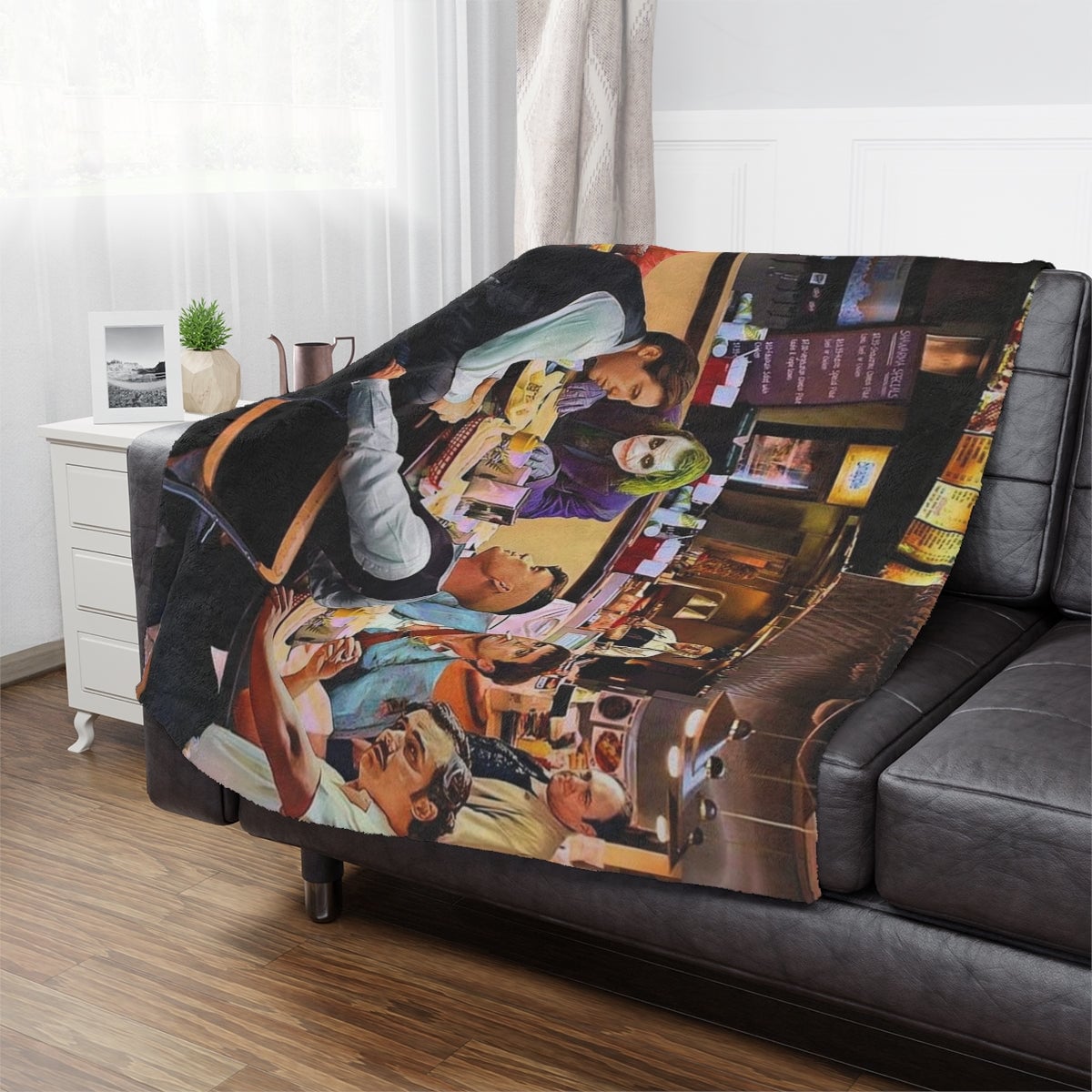 The Best Famous Mobster Movies Minky Blanket draped over a sofa, creating a nostalgic atmosphere.